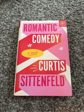 Curtis Sittenfeld "Romantic Comedy" Hardcover Book - Pink & Red Cover